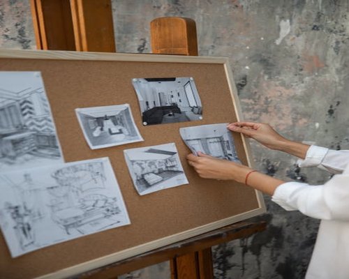 Creative workspace with mood boards and drafts